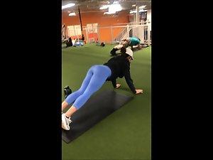 Flexible girl doing her stretching routine in the gym Picture 4