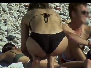 Ass massage between hot friends on beach Picture 5