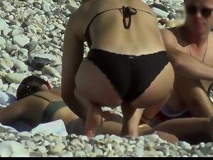 Ass massage between hot friends on beach Picture 6