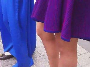 Upskirt look under milf's purple skirt Picture 3