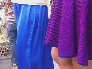 Upskirt look under milf's purple skirt Picture 4