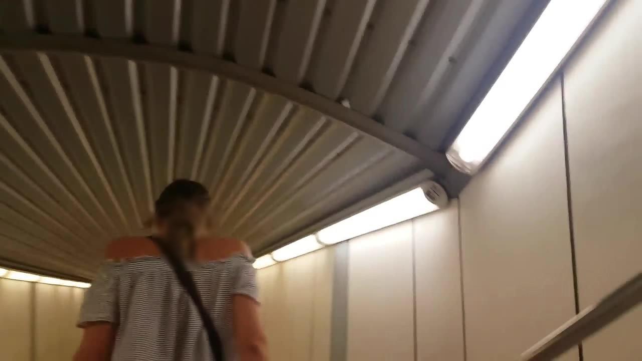 Upskirt while teen girl rushes in subway