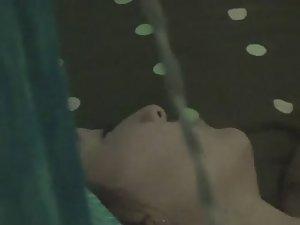 Peeping on a teen girl through a window Picture 3