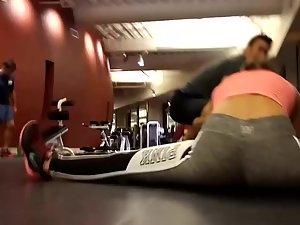 Fit girl does a full split while stretching in the gym Picture 7