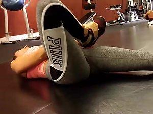 Fit girl does a full split while stretching in the gym Picture 8
