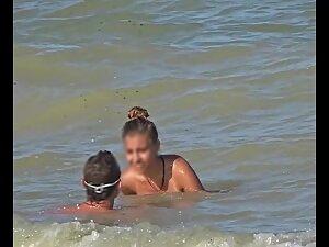 Topless alt girl looks very erotic when she plays on the beach Picture 2