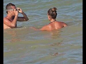 Topless alt girl looks very erotic when she plays on the beach Picture 3