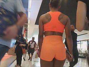 Muscular and sexy black girl in mall Picture 1