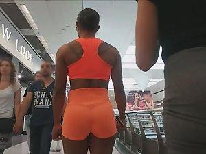 Muscular and sexy black girl in mall Picture 2