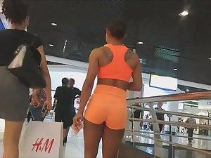 Muscular and sexy black girl in mall Picture 6