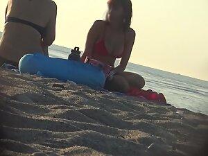 Big young breasts in a red bikini top Picture 2