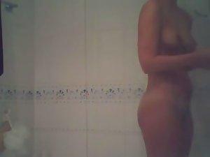 Attractive teen girl spied in the shower Picture 4