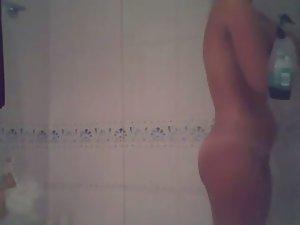 Attractive teen girl spied in the shower Picture 5