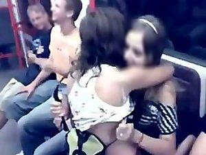 Wild teen girls kissing in a full train