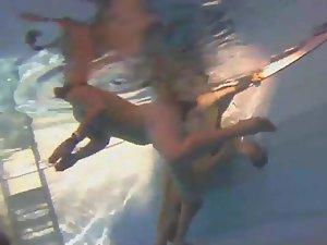 Naked girls spied from under the water Picture 3