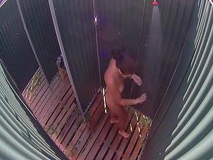 Sexy woman in a beach shower cabin Picture 3