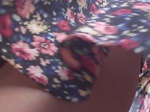 Black thong under hot brunette's skirt Picture 5