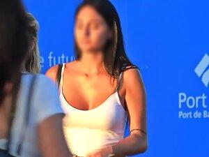 Voyeur zooms in on her kissable face and big boobs Picture 3