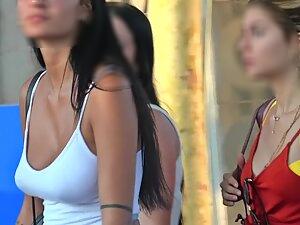 Voyeur zooms in on her kissable face and big boobs Picture 4