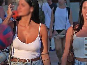 Voyeur zooms in on her kissable face and big boobs Picture 7