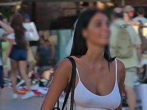 Voyeur zooms in on her kissable face and big boobs Picture 8