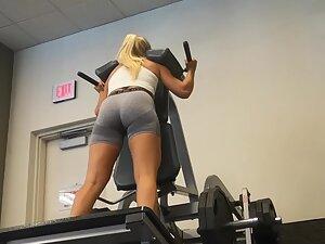 Peeping on fit blonde exercising her glutes in the gym Picture 3