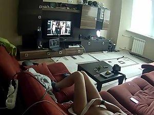 Spying a girl rubbing pussy to some porn Picture 3