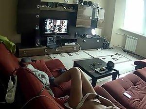 Spying a girl rubbing pussy to some porn Picture 4