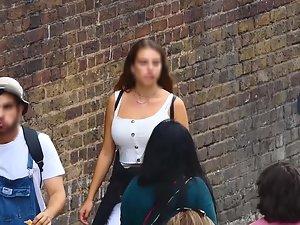 Busty girl walks and licks her lips Picture 2