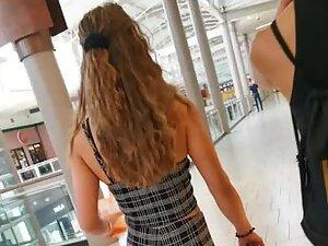 Sexy figure in tight checkered outfit