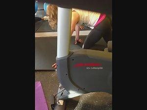 Flexible girl stretches in the gym Picture 2