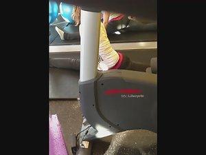 Flexible girl stretches in the gym Picture 4