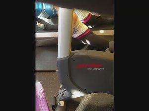 Flexible girl stretches in the gym Picture 5