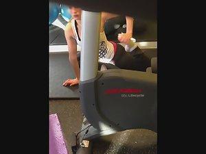 Flexible girl stretches in the gym Picture 8