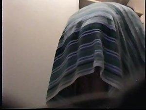 Voyeuring a hot woman as she dresses Picture 8