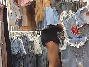 Sassy teen girl revels cheeks in shorts