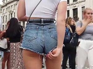 She pulls the shorts out when they go too deep in her ass