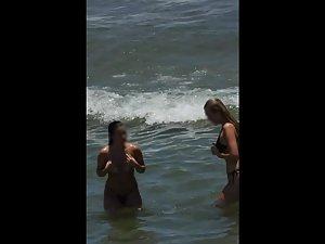 Hot teen girls enjoying the ocean water Picture 2