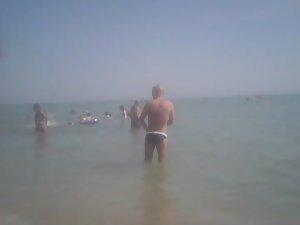 Topless girl in a red thong Picture 5