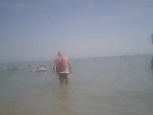 Topless girl in a red thong Picture 6