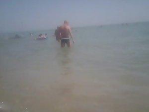 Topless girl in a red thong Picture 7