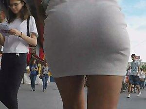 Seductive walk in tight white dress Picture 2