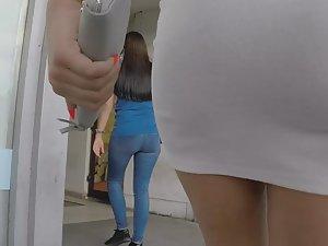 Seductive walk in tight white dress Picture 4