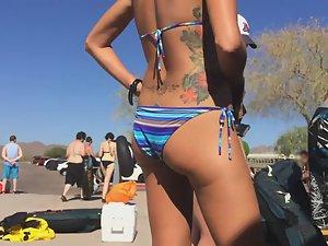 Tiny bikini can't cover her big fake boobs Picture 8