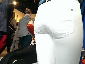 Store worker in tight white pants Picture 3