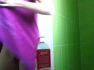 Slim girl undresses and showers in front of hidden cam Picture 1