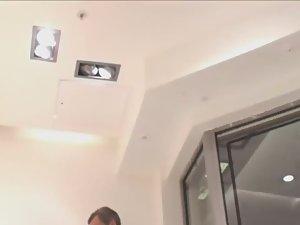 Secretly watching upskirt of gorgeous girl in shoe store Picture 1