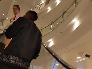 Upskirt of lovely ass cheeks in shopping mall Picture 2