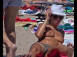 Little bikini barely covers topless girl's pussy Picture 3