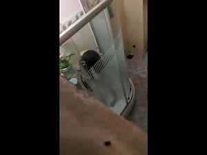 Peeping on naked girl in shower from above Picture 2